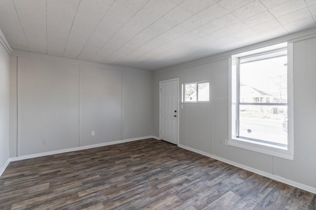 entryway with dark wood-style floors