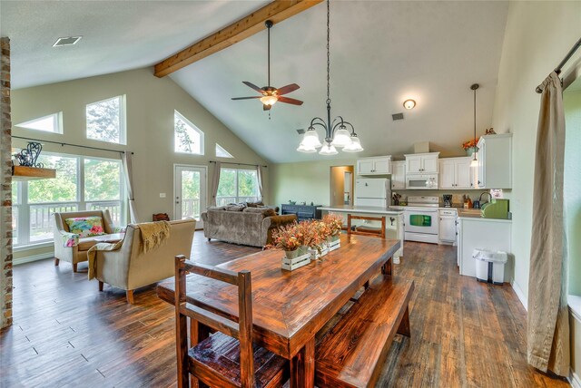 480 Caney Creek Dr, Livingston, TX 77351 - dining space with high vaulted ceiling, dark wood-style floors, beam ceiling, a chandelier, and a ceiling fan