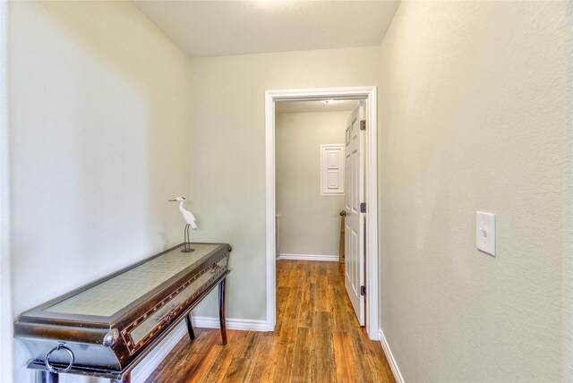 480 Caney Creek Dr, Livingston, TX 77351 - corridor featuring wood finished floors and baseboards