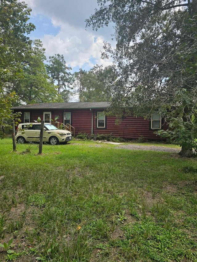 exterior space featuring a yard