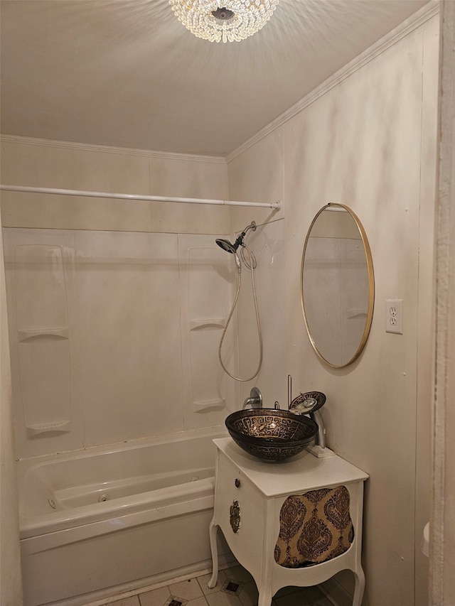 full bathroom featuring tile patterned flooring, a sink, and shower / tub combination