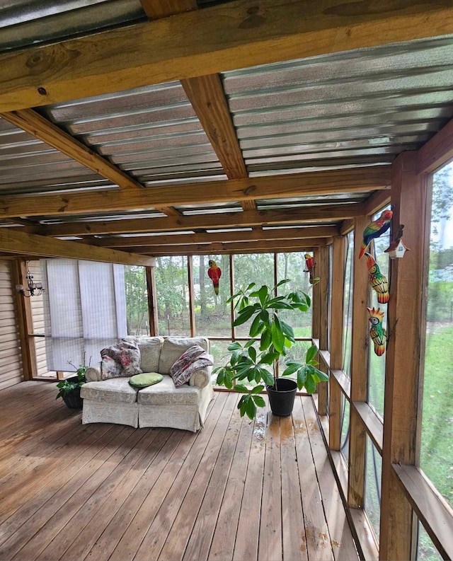 unfurnished sunroom with plenty of natural light