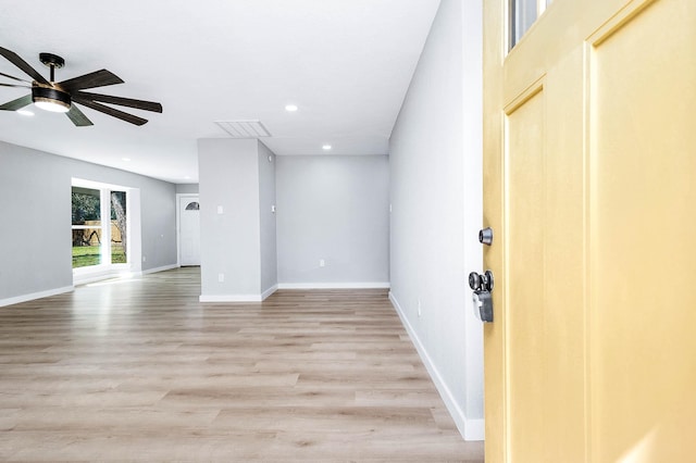 unfurnished room featuring recessed lighting, visible vents, light wood-style floors, ceiling fan, and baseboards