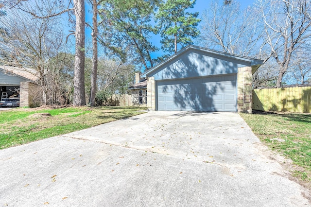 garage with fence