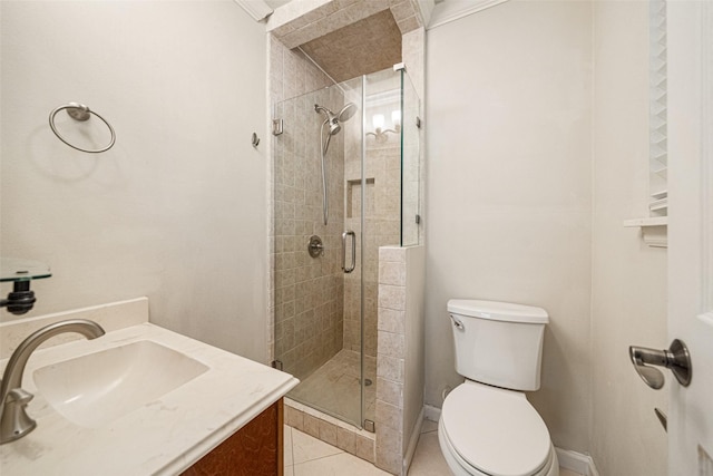 full bathroom with toilet, a shower stall, vanity, tile patterned flooring, and baseboards