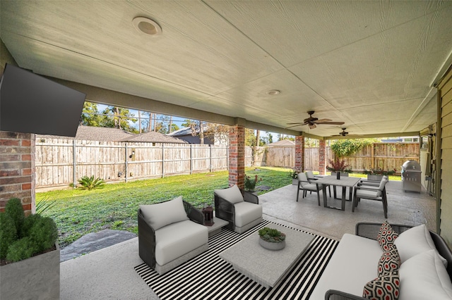 view of patio / terrace featuring ceiling fan, a fenced backyard, outdoor lounge area, and area for grilling