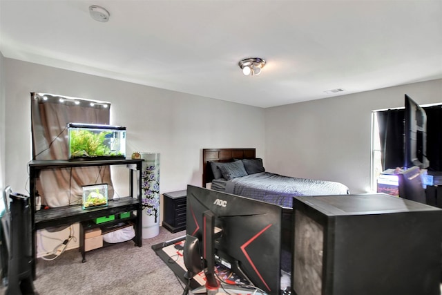 bedroom featuring visible vents and carpet flooring