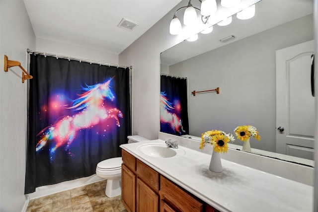 bathroom featuring toilet, a shower with shower curtain, vanity, and visible vents