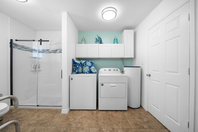 clothes washing area with laundry area and washing machine and clothes dryer