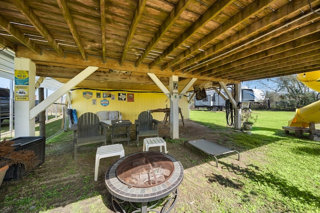 view of patio featuring an outdoor fire pit