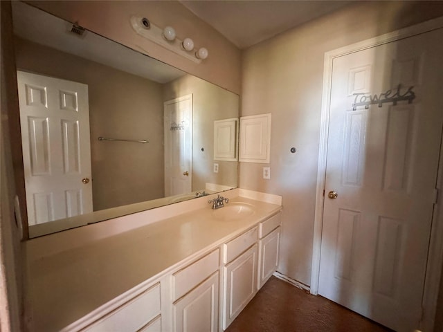 bathroom featuring visible vents and vanity