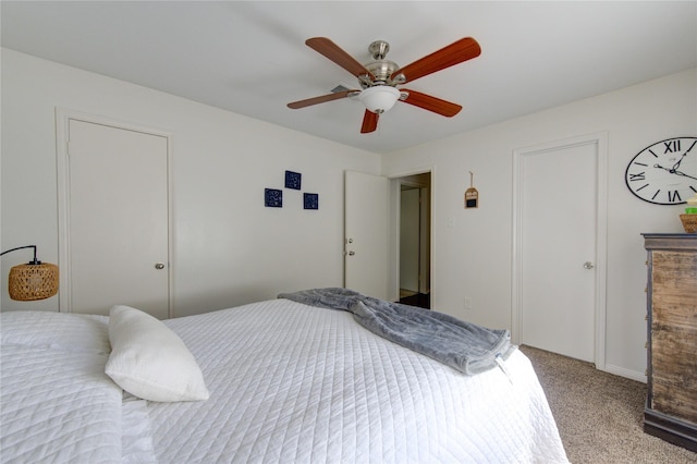 bedroom featuring ceiling fan and carpet flooring