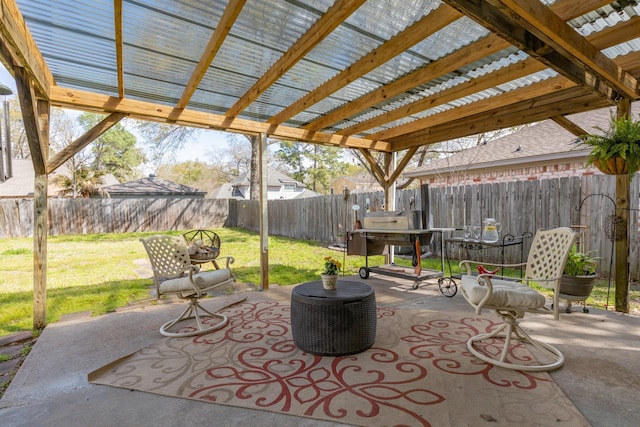 view of patio featuring a fenced backyard and a pergola