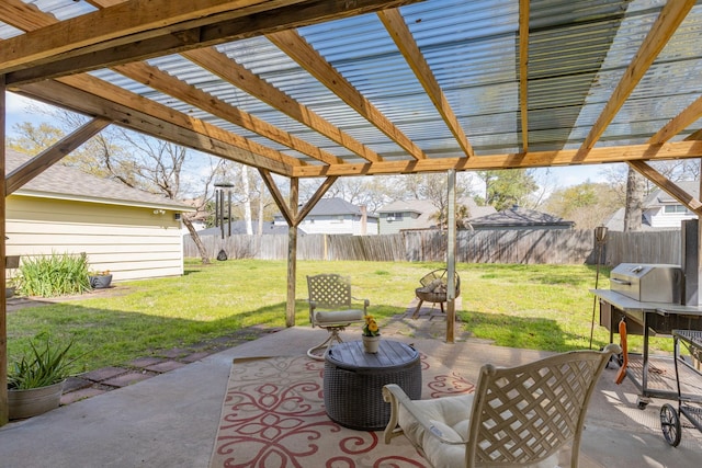 view of patio / terrace with a fenced backyard and a pergola