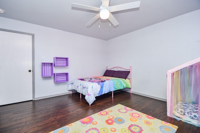 bedroom featuring ceiling fan and wood finished floors