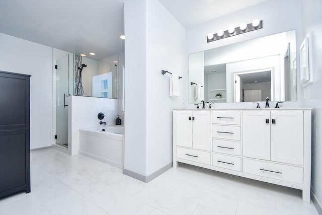 full bath with double vanity, a bath, marble finish floor, a shower stall, and a sink