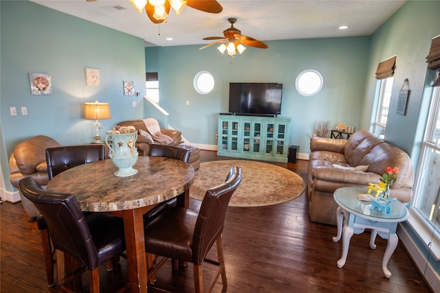 dining area with hardwood / wood-style floors, recessed lighting, and baseboards