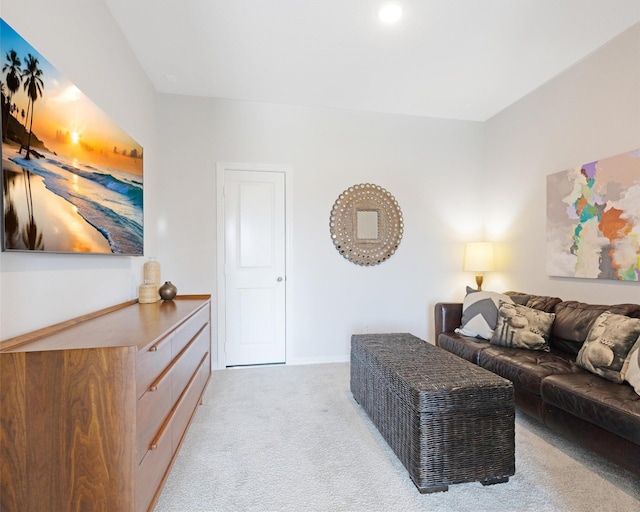 living room featuring light carpet