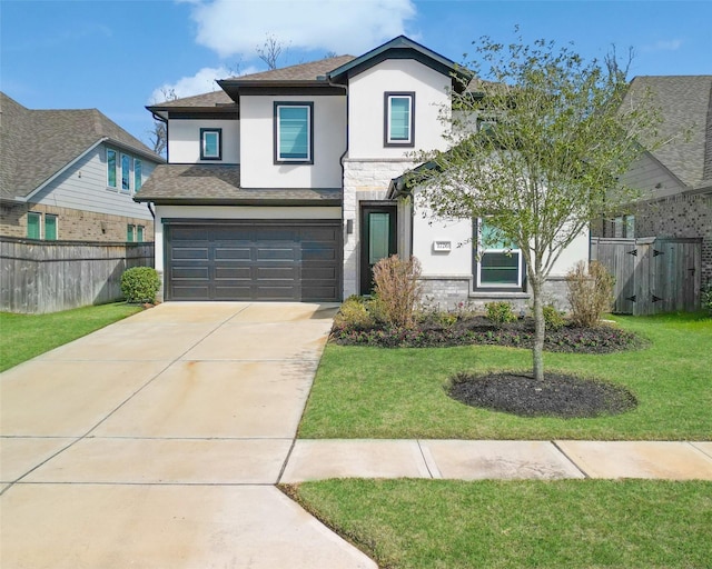 traditional home featuring stone siding, stucco siding, a front yard, and fence