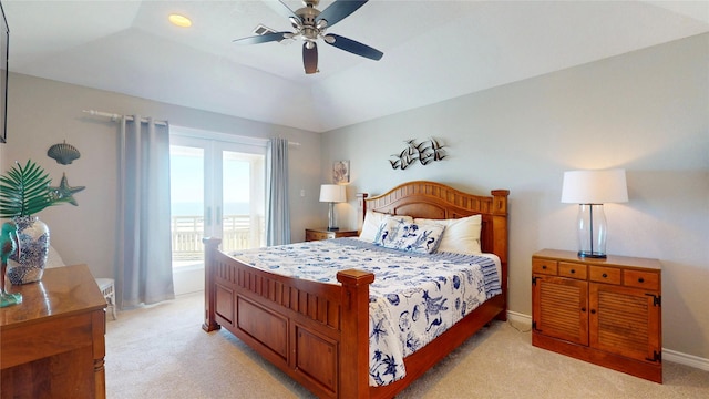 bedroom with baseboards, a ceiling fan, light colored carpet, lofted ceiling, and access to exterior