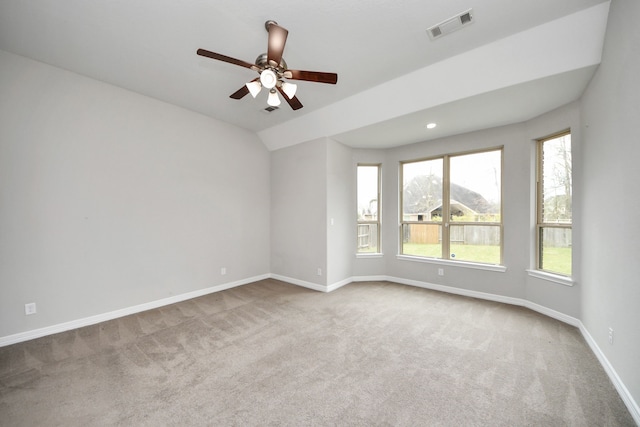 unfurnished room with baseboards, visible vents, lofted ceiling, carpet, and recessed lighting