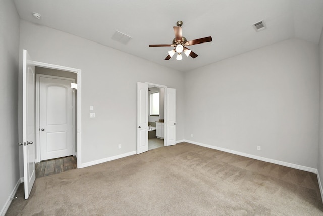 unfurnished bedroom with a ceiling fan, baseboards, visible vents, and carpet flooring