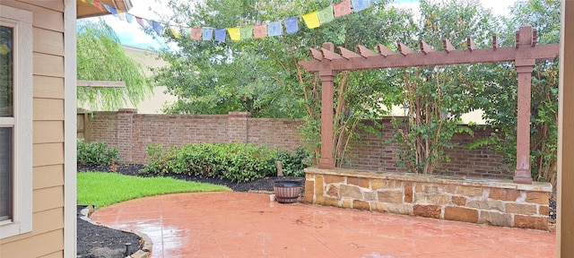view of patio / terrace with fence