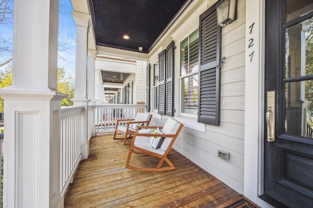 wooden deck featuring a porch