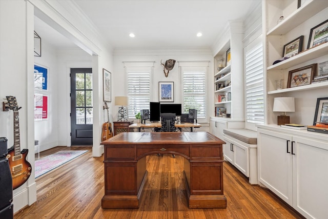 home office featuring recessed lighting, wood finished floors, and crown molding