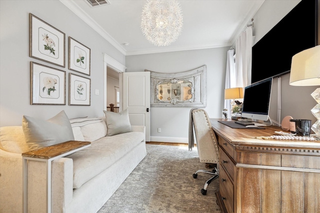 office area with a notable chandelier, baseboards, and crown molding