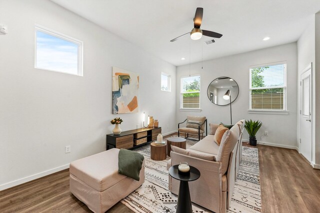 2110 Dewalt St Unit H, Houston, TX 77088 - living room featuring wood finished floors, ceiling fan, baseboards, and recessed lighting