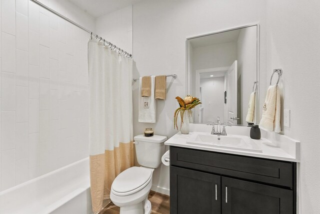 2110 Dewalt St Unit H, Houston, TX 77088 - full bathroom with vanity, toilet, wood finished floors, and shower / bath combo