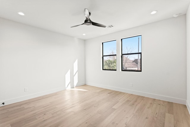 unfurnished room featuring baseboards, ceiling fan, recessed lighting, and light wood-style floors