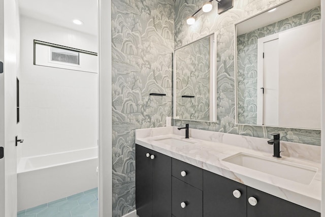 1225 Althea Dr, Houston, TX 77018 - full bathroom with wallpapered walls, double vanity, and a tub