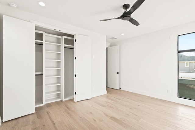 unfurnished bedroom featuring baseboards, wood finished floors, a ceiling fan, and recessed lighting