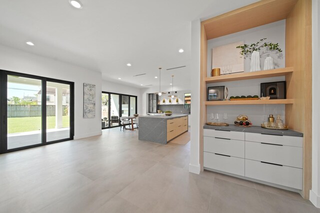1225 Althea Dr, Houston, TX 77018 - kitchen featuring modern cabinets, recessed lighting, white cabinetry, open shelves, and baseboards