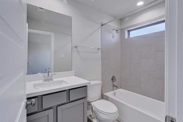 full bath featuring toilet, recessed lighting,  shower combination, and vanity