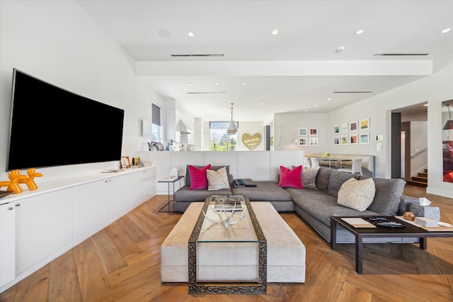 living room with recessed lighting