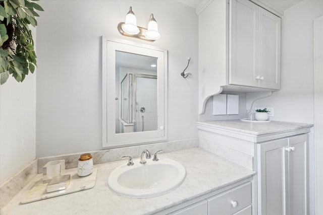 full bath featuring a stall shower and vanity