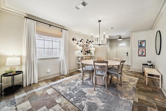 dining room with a notable chandelier, baseboards, visible vents, and stone tile flooring