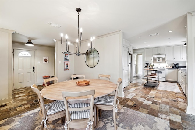 dining space featuring stone finish floor, baseboards, visible vents, and recessed lighting