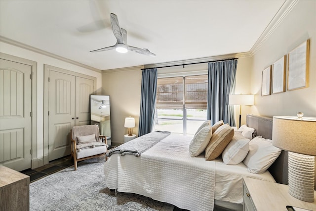 bedroom featuring a ceiling fan, access to exterior, a closet, and crown molding