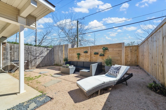 view of patio with outdoor lounge area and a fenced backyard