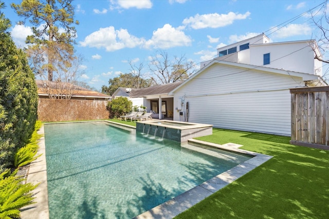 view of pool with a fenced in pool, fence, a lawn, and an in ground hot tub