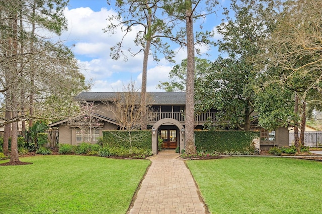 view of front of home with a front lawn