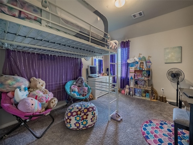 carpeted bedroom with visible vents and baseboards