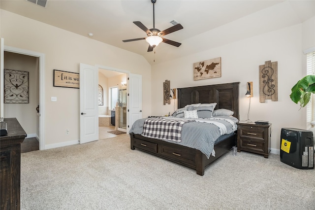 bedroom with light carpet, visible vents, baseboards, and lofted ceiling