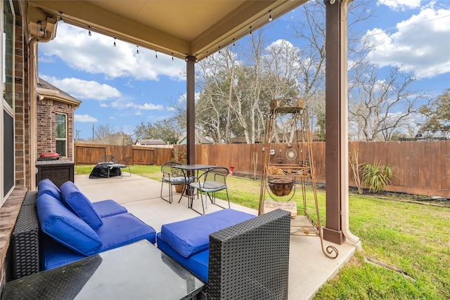 view of patio / terrace with a fenced backyard and an outdoor living space