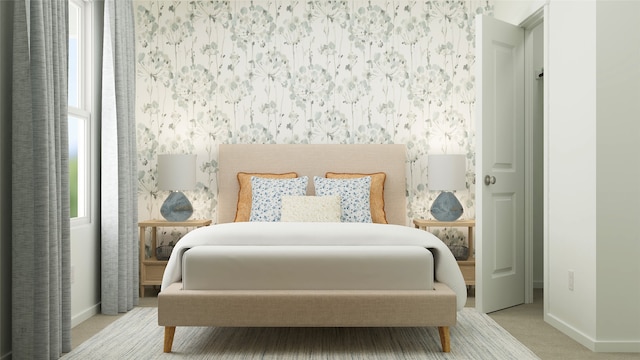 bedroom with light carpet, wallpapered walls, and baseboards