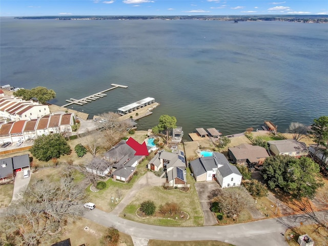 aerial view featuring a residential view and a water view